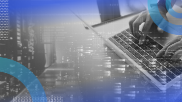 A closeup on an engineer working on a laptop with an overlay of code